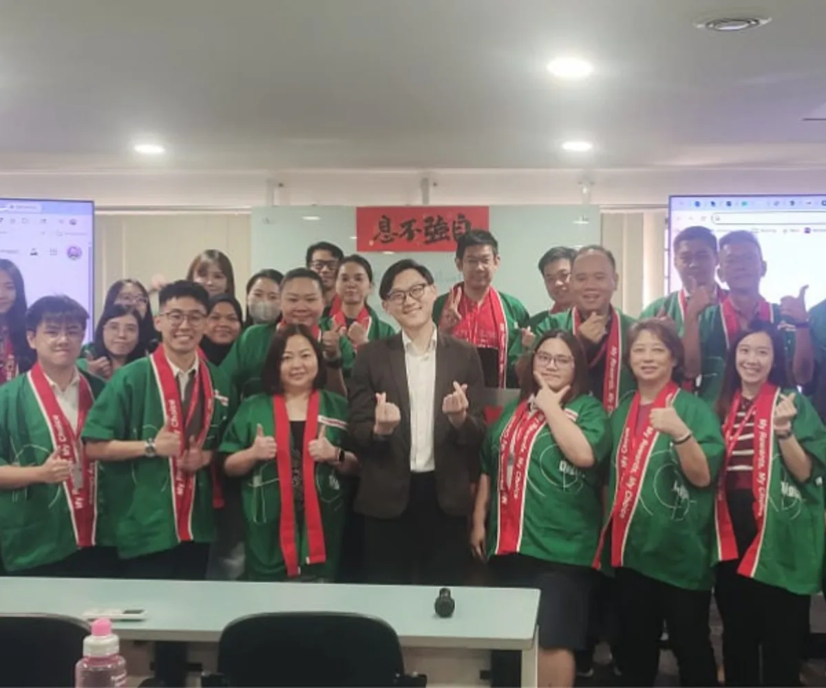 Group selfie with marketing professionals at a workshop