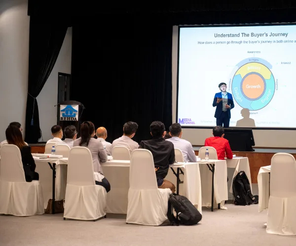 Alexander Ang presenting the buyer journey framework