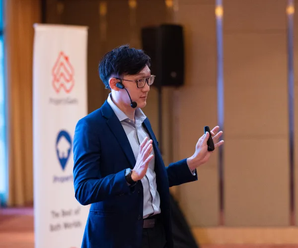 Alexander Ang at a PropertyGuru keynote